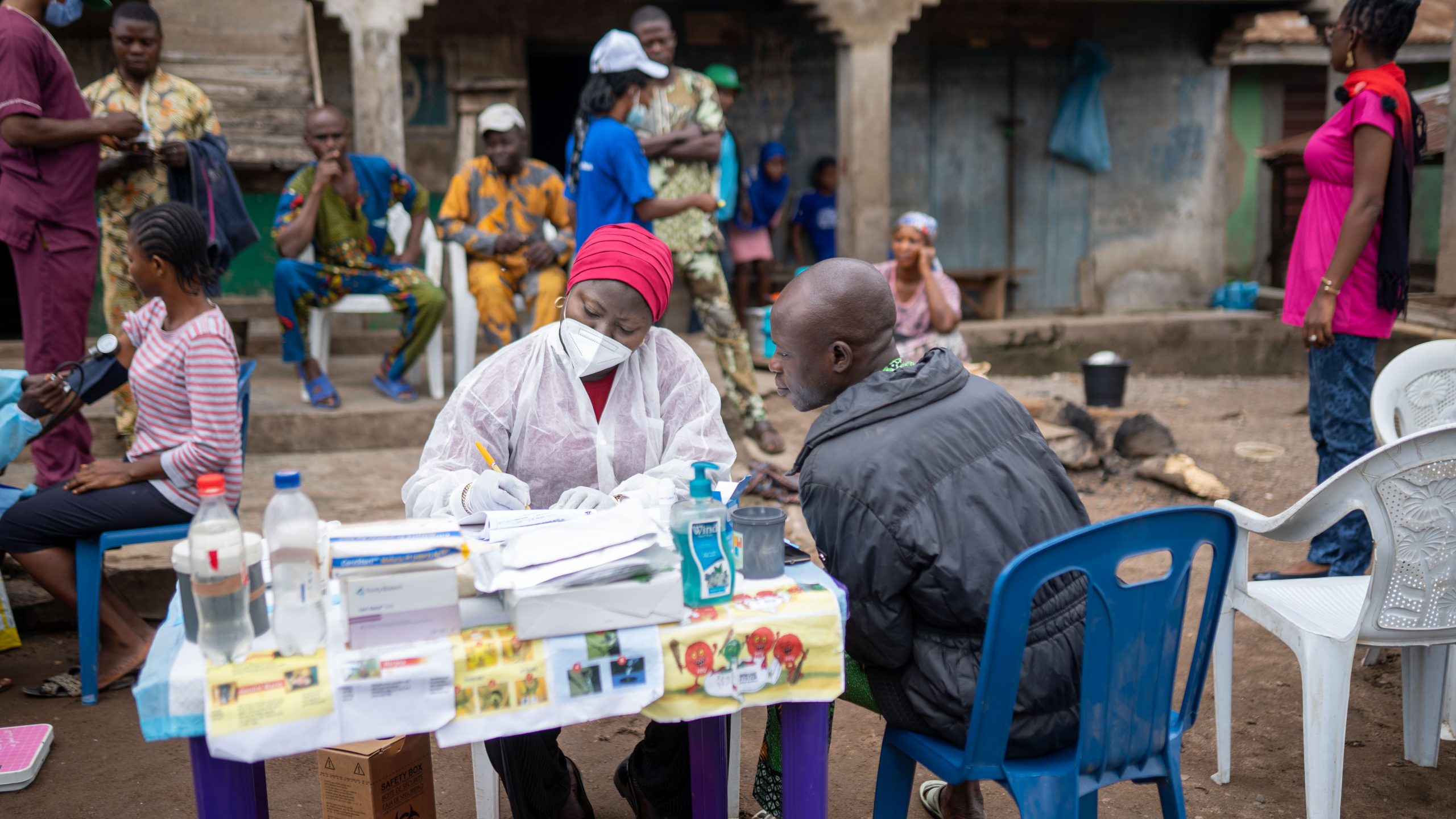 APIN community health personnel delivering health services in a rural setting.