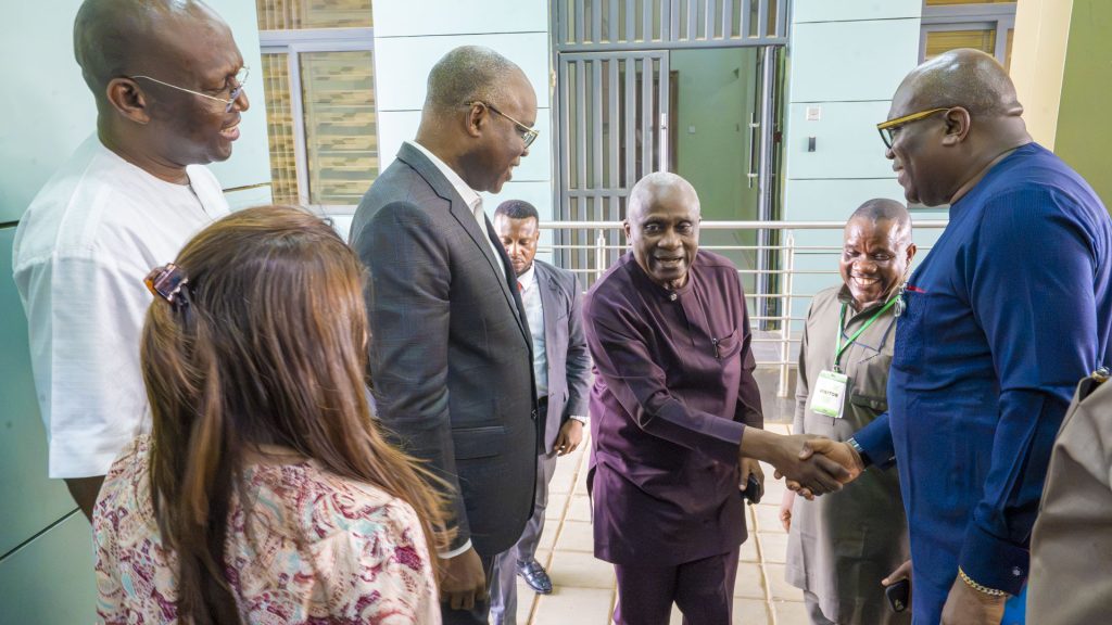 APIN executive leadership shaking hands with key government stakeholders.